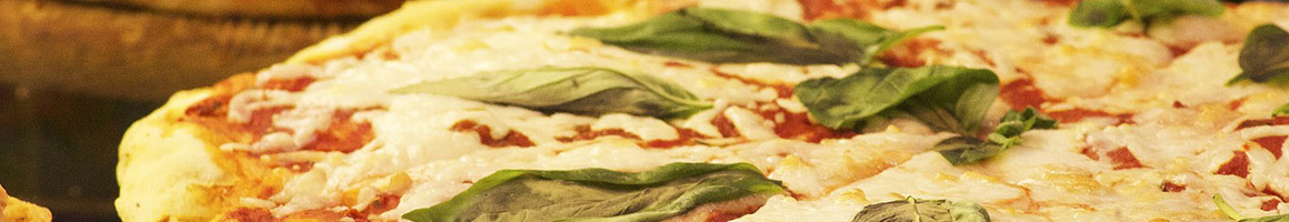 Eating Italian Pizza at Fremont Pizzeria restaurant in Fremont, NH.
